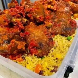 Jollof rice with chicken and extra plantain